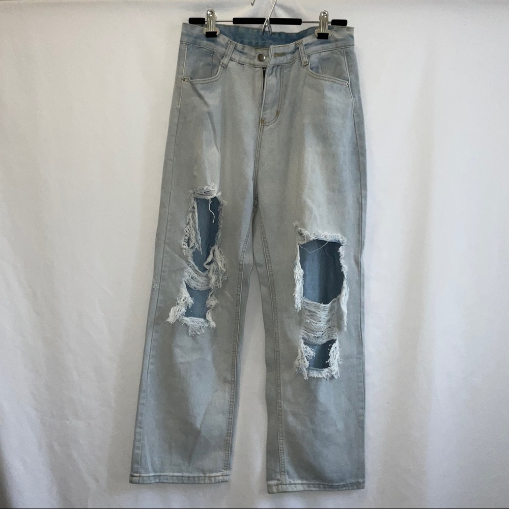 light-washed blue denim ripped jeans